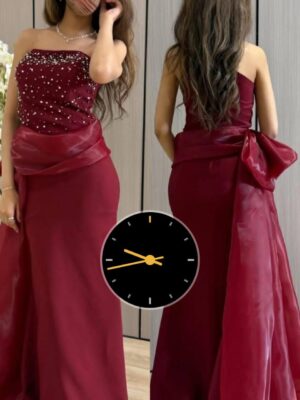 فستان سهرة خمري فاخر بتفصيل لؤلؤ و قصة أنثوية جذابة